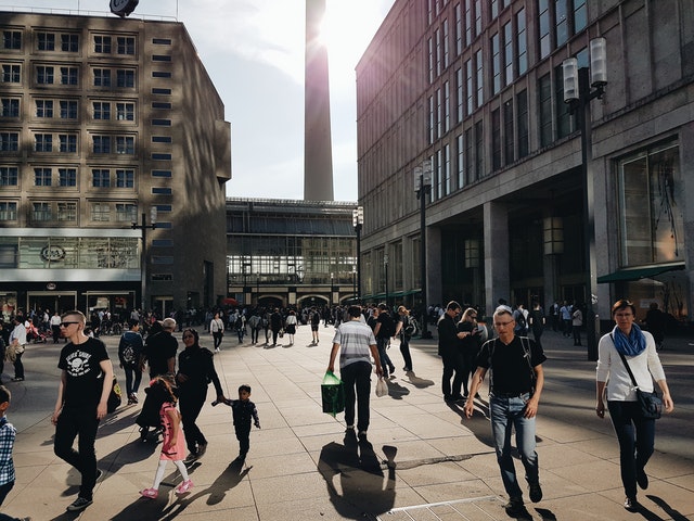 people walking outside in community area