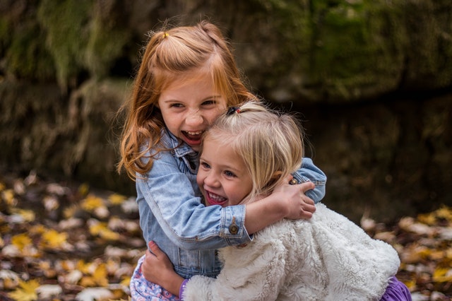 two little girls laughing