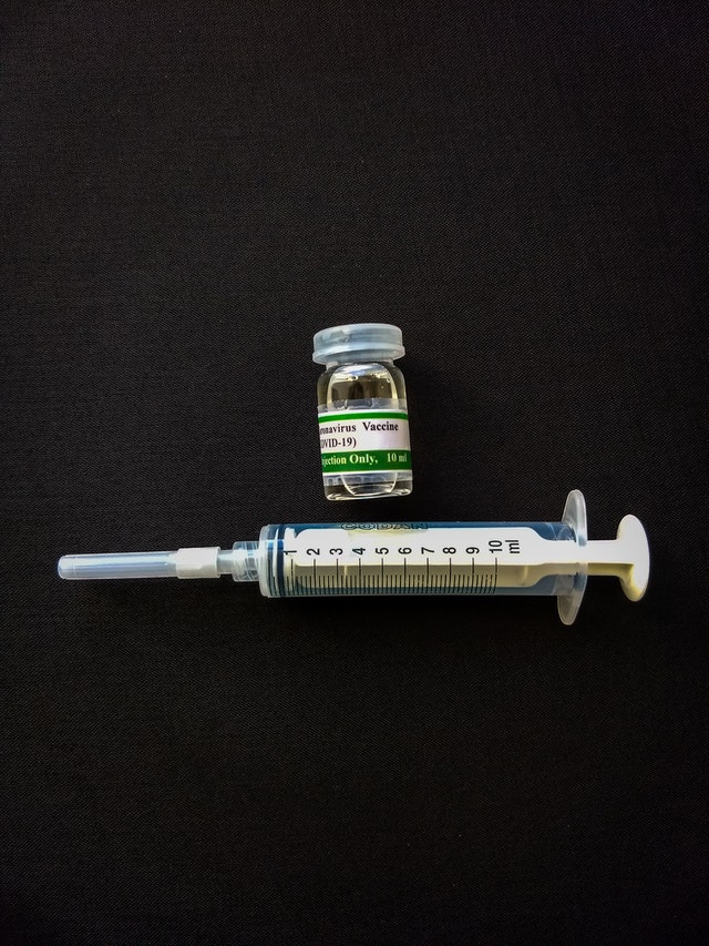 COVID-19 vaccines vial and syringe
