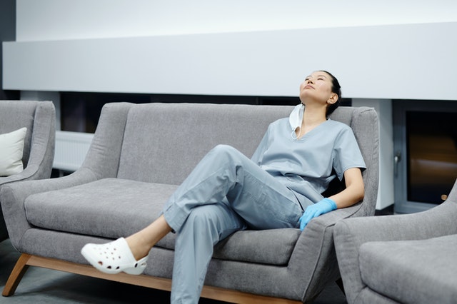 doctor resting on couch