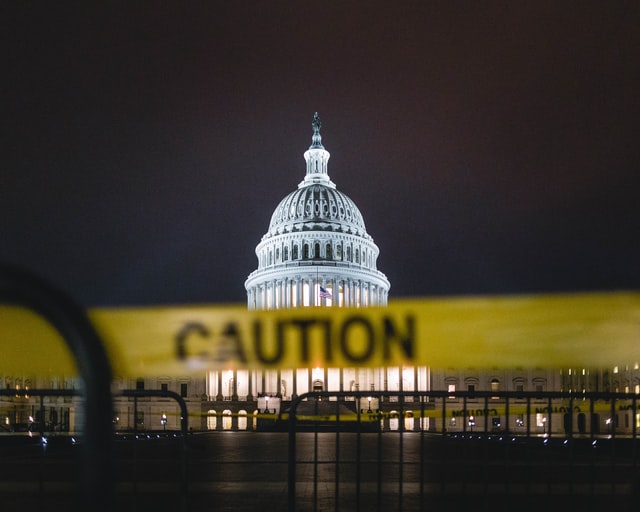 Caution tape photographed in front of the United States Capitol