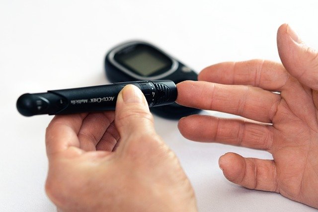 A person checking their blood sugar level

