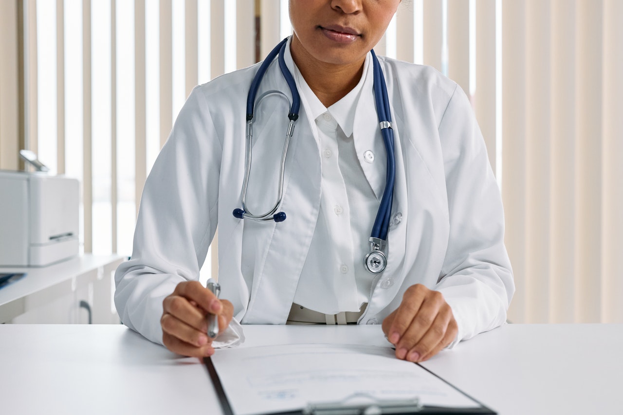 doctor reviewing paperwork