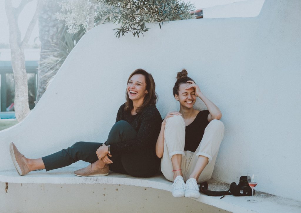 two women laughing