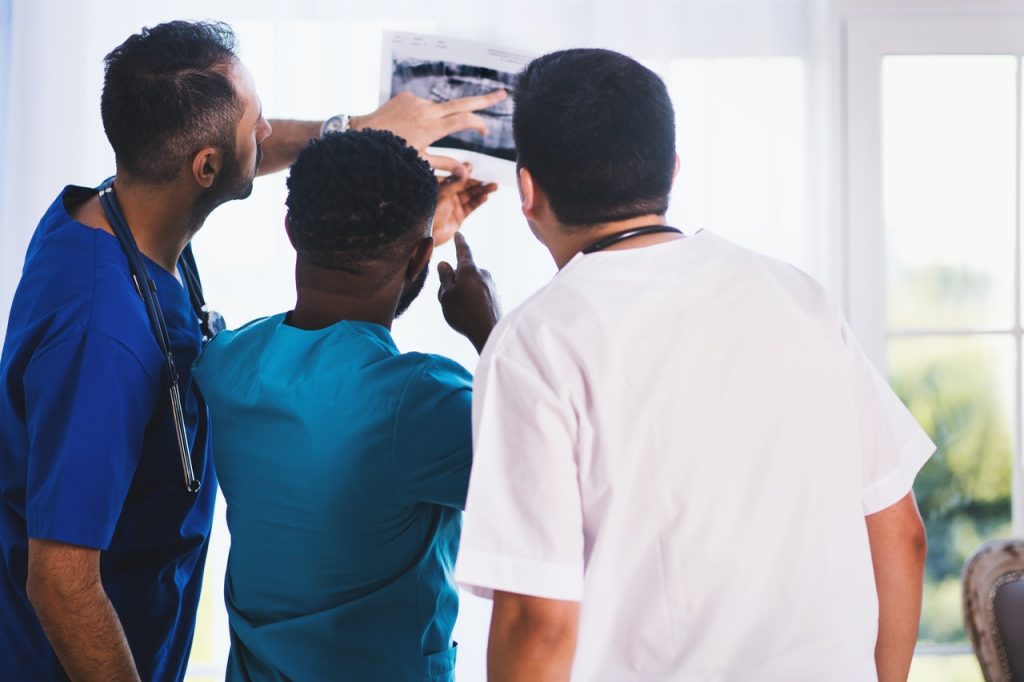 doctors looking at x-ray at teaching hospital