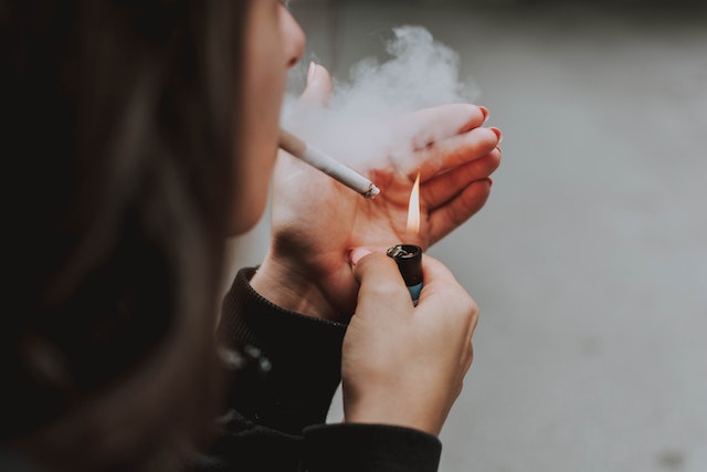 woman smoking cigarette