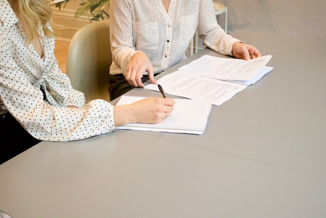 employees reviewing job description