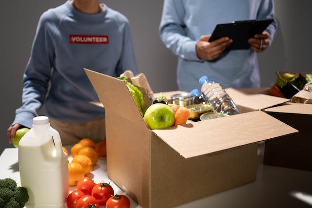 volunteers passing out food