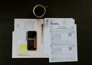 Tax form, folder, calculator