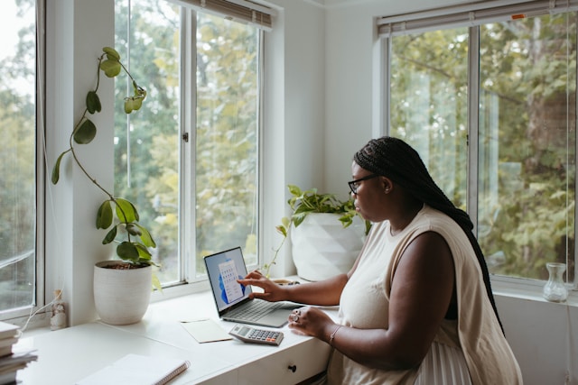 A woman working from her home office